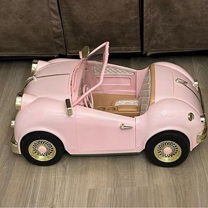 Our Generation Pink Retro Convertible Car plays FM Radio.